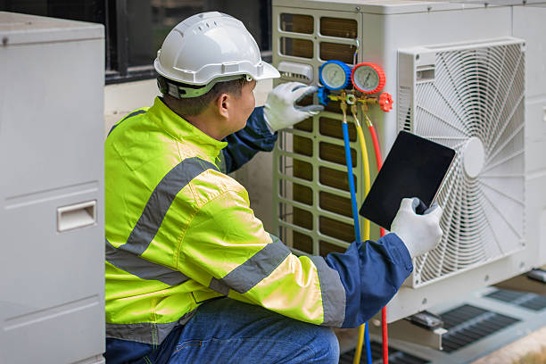 Professional Air Duct Cleaning technician working in Rembrandt, IA